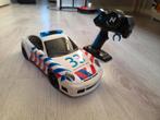 Rc politieauto van Nikko, Hobby en Vrije tijd, Elektro, Ophalen of Verzenden, Zo goed als nieuw, Auto onroad