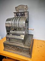 Antieke kassa "Anker" uit 1906, Ophalen