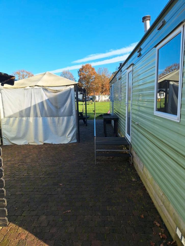 Stacaravan te koop jaarplaats in Biddinghuizen, Caravans en Kamperen, Stacaravans, Ophalen