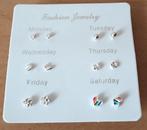 6 Paar oorbellen op een kaartje voor ma/di/woe/do/vrij/za/zo, Overige materialen, Nieuw, Ophalen of Verzenden, Knopjes of Stekers