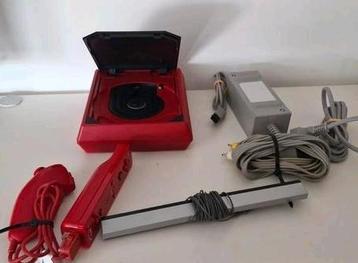 Nintendo wii mini met 9 games.  beschikbaar voor biedingen