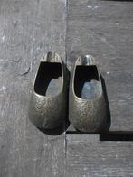 Decoratie schoentjes van messing., Ophalen