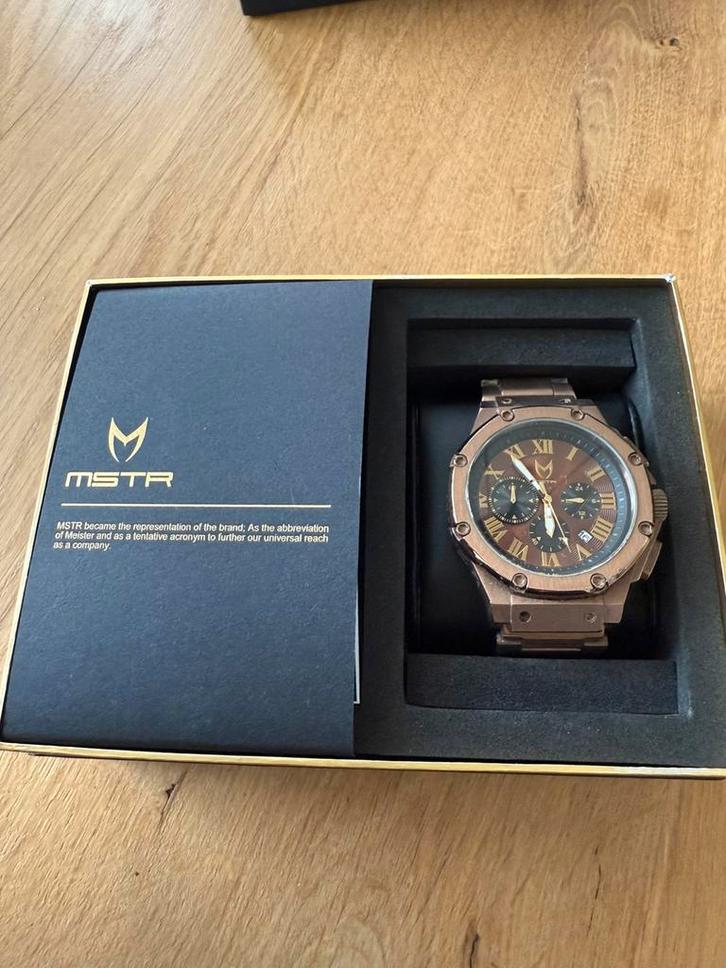 MSTR Ambassador Horloge bruin goud, Sieraden, Tassen en Uiterlijk, Horloges | Heren, Zo goed als nieuw, Overige merken, Staal