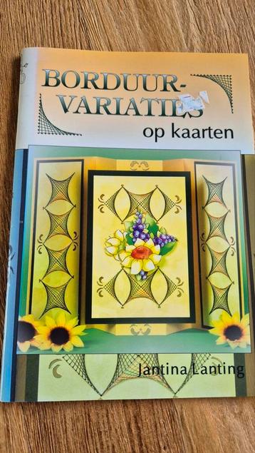 Boekje borduren op kaarten beschikbaar voor biedingen
