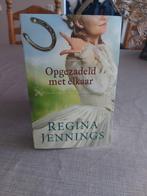 Regina Jennings - Opgezadeld met elkaar Het boek is nieuw., Boeken, Regina Jennings, Ophalen of Verzenden