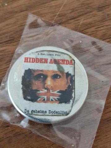 F 208 Hidden Agenda Film Button - De geheime dodenlijst beschikbaar voor biedingen