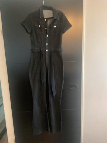 Jeans jumpsuit/ zwart/strechstof/ maat m.l beschikbaar voor biedingen