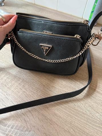 Guess tas beschikbaar voor biedingen