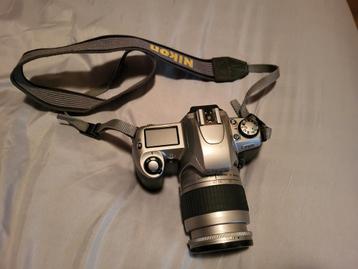 Zeer goed werkende analoog nikon f65 met veel extras beschikbaar voor biedingen