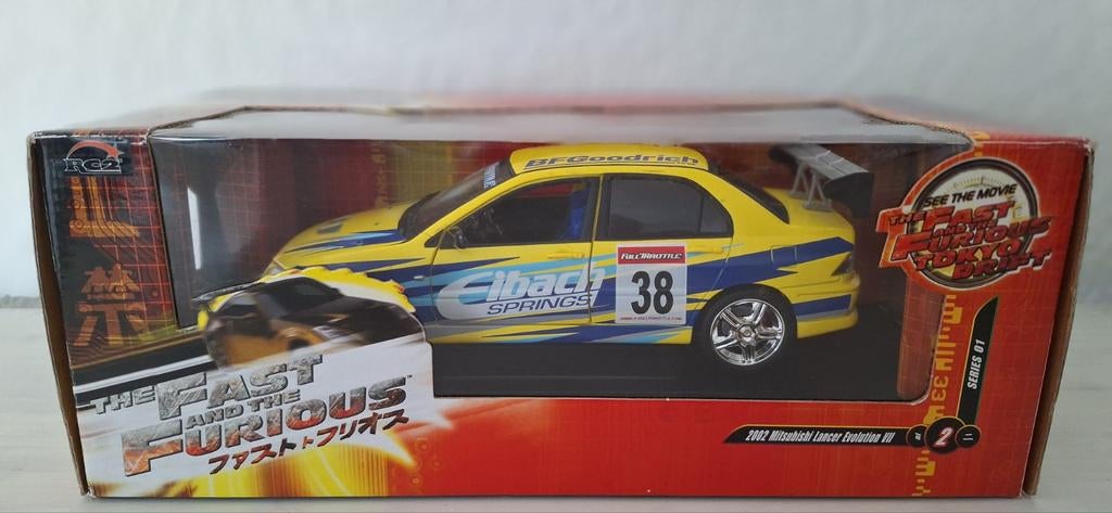Mitsubishi Evo 1:18 ERTL, Hobby en Vrije tijd, Modelauto's | 1:18, Ophalen of Verzenden, ERTL