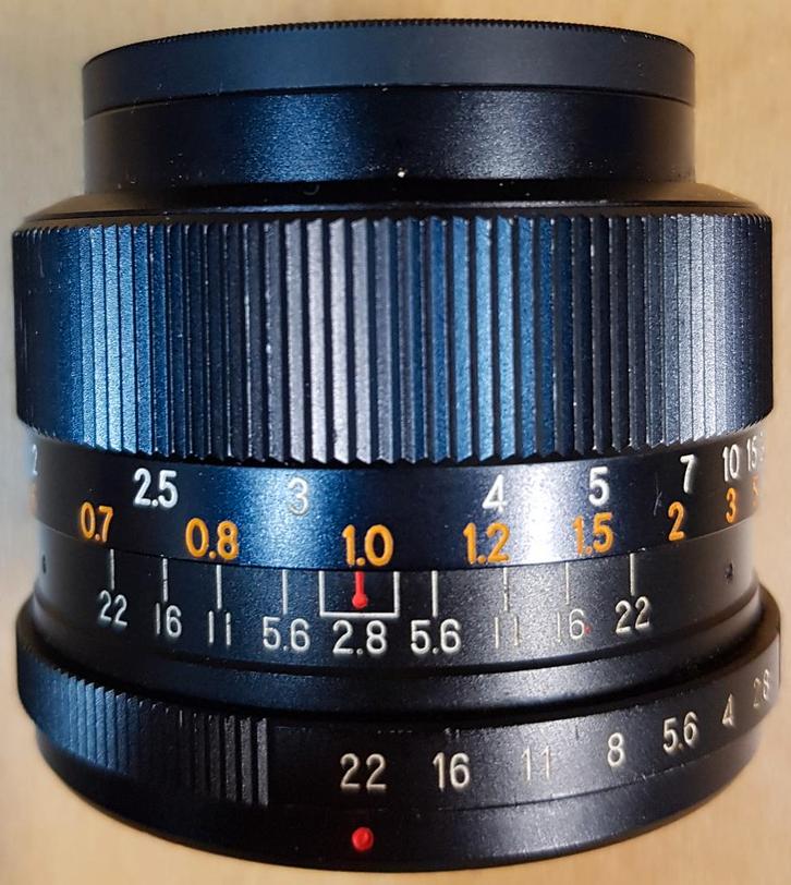 Revuenon-special 35 mm lens met Hoya Skylight filter, Audio, Tv en Foto, Fotografie | Lenzen en Objectieven, Gebruikt, Groothoeklens