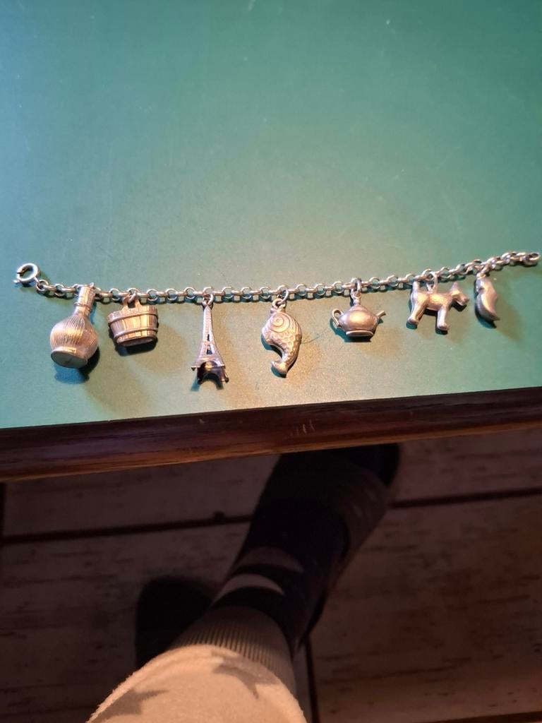 Zilveren  bedelarmband  7 bedels, Ophalen of Verzenden