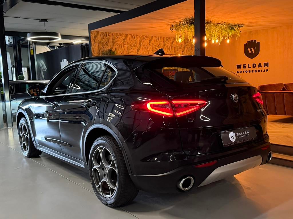 Alfa Romeo Stelvio 2.0 T AWD Super Garantie 280 PK Memory Le, Auto's, Alfa Romeo, Automaat, Zwart, 4 cilinders, Zwart