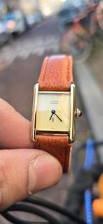 Cartier Tank de Must horloge, Sieraden, Tassen en Uiterlijk, Horloges | Dames, Ophalen of Verzenden, Leer, Overige merken