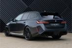 BMW M5 Touring V8 Hybride M Keramisch Frozen Pano Alcant.Hem, Auto's, BMW, Gebruikt, 2000 kg, 4395 cc, Vierwielaandrijving