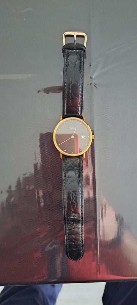 Prisma horloge goudkleurig met leren bandje, Sieraden, Tassen en Uiterlijk, Horloges | Heren, Overige merken, Polshorloge, Ophalen of Verzenden