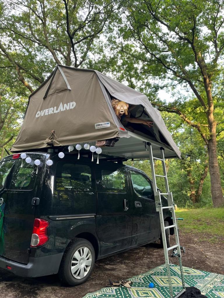 Nissan NV200 2011 Zwart mini camper / 7p, 1309 kg, 7 stoelen, Zwart, 14 km/l