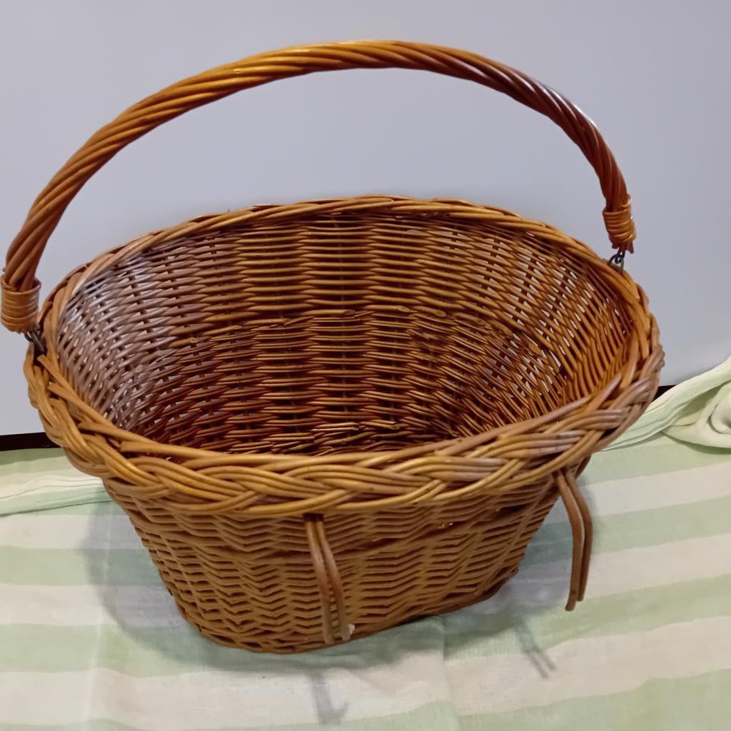Rieten fietsmand, Ophalen