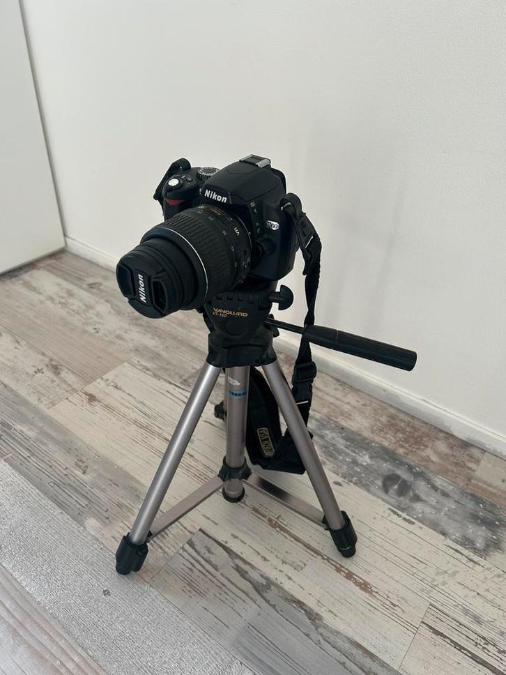 Nikon D3100 + 18-55mm VR lens + Vanguard VT-150 statief, Audio, Tv en Foto, Fotocamera's Digitaal, Zo goed als nieuw, Spiegelreflex
