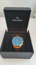 Mats Meier horloge. Goudkleurig met blauwe wijzerplaat, Ophalen of Verzenden, Staal, Overige merken