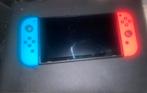 Gloednieuwe Nintendo Switch Rode Blauwe editie + accessoires, Spelcomputers en Games, Spelcomputers | Nintendo Switch, Ophalen