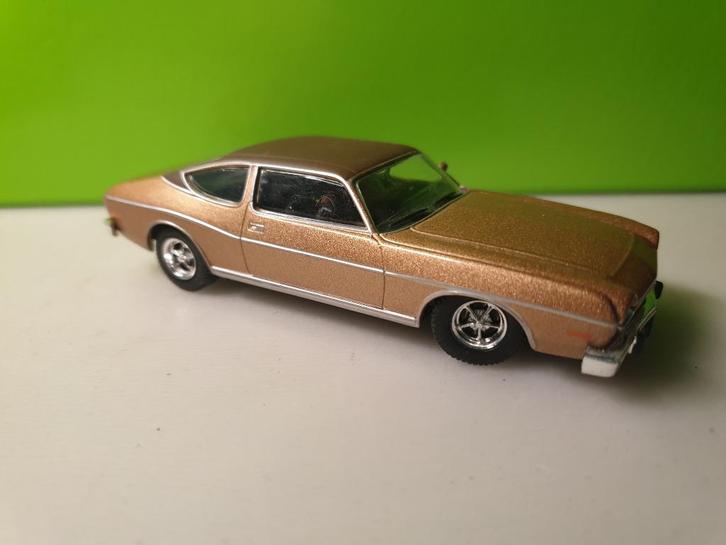Universal Hobbies James Bond - AMC Matador Coupe [brons]1/43, Hobby en Vrije tijd, Modelauto's | 1:43, Zo goed als nieuw, Auto