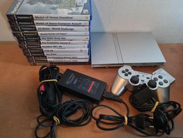 PS2 Slim Silver met 12 games beschikbaar voor biedingen