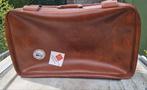Leren vintage koffer, Ophalen