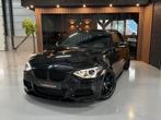 BMW 1-Serie 3.0 M135i xDrive 400PK STAGE2/CAMERA/MPERFORMANC, Zwart, 320 pk, Zwart, Leder
