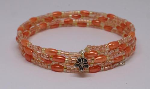 Spiraalarmband met oranje rocailles en ovalen kraaltjes, Sieraden, Tassen en Uiterlijk, Armbanden, Nieuw, Overige materialen, Oranje
