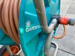 Haspel met tuinslang 15 a 20 meter, Tuin en Terras, Tuinslangen, Ophalen of Verzenden, Gebruikt, Tuinslang