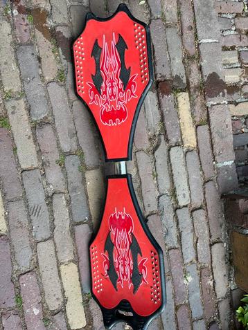 Te koop wave board met schaats-ijzers beschikbaar voor biedingen