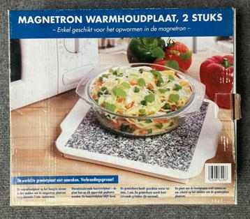 Twee magnetron warmhoudplaten beschikbaar voor biedingen