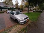 Daewoo Lanos 1.6 16V AUT 2001 Grijs, Auto's, Daewoo, Stof, 1052 kg, 4 cilinders, Elektrische ramen