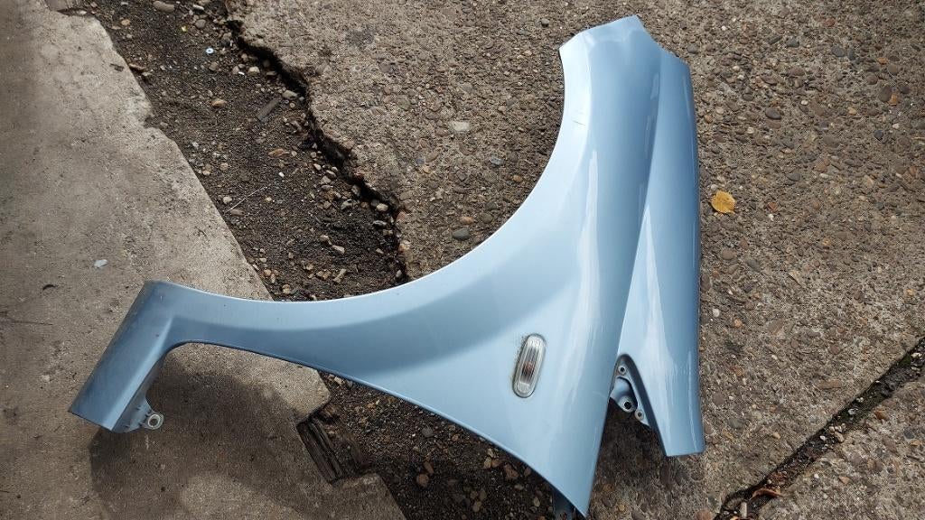 Linker blauw voorscherm Punto 2007, Auto diversen, Ophalen of Verzenden