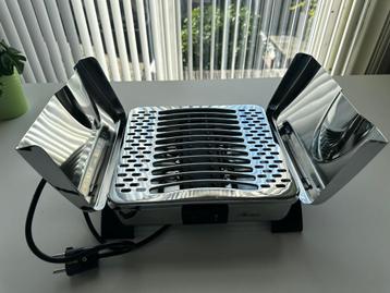 Bordenverwarmer beschikbaar voor biedingen