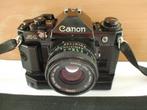 Canon A-1 reflexcamera met Power Winder A2 en 50mm F/1.8, Ophalen of Verzenden, Gebruikt, Spiegelreflex, Canon