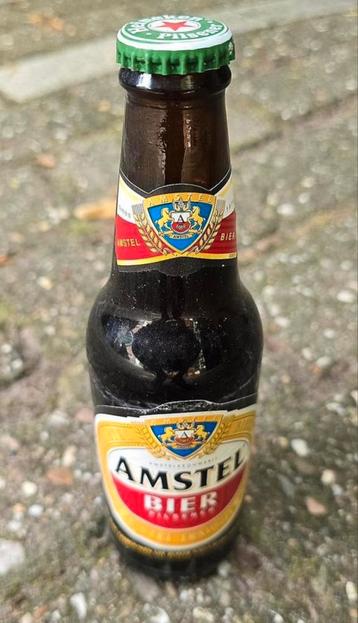 Amstel Herfstbok bierflesje met Heineken dop beschikbaar voor biedingen