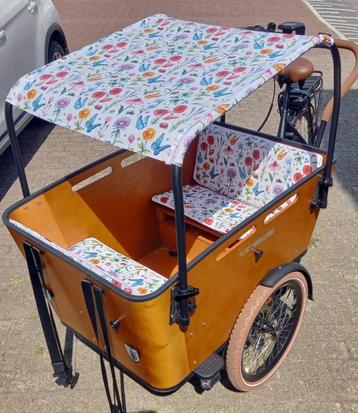 Nieuwe kussens en zonneluifels voor diverse bakfietsen beschikbaar voor biedingen