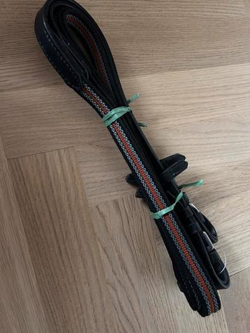 NIEUWE teugels, leer met rubbergrip beschikbaar voor biedingen