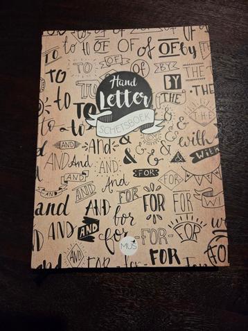 Hand letter schetsboek beschikbaar voor biedingen