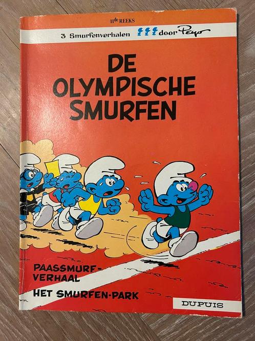 Stripboek De Olympische Smurfen, Verzamelen, Smurfen, Gebruikt, Verschillende Smurfen, Ophalen of Verzenden