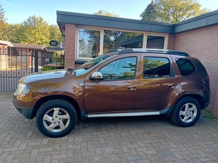 Te koop: Dacia Duster 2010 – Betrouwbaar, Ruim & Zuinig, Auto's, Dacia, Particulier, LPG, Handgeschakeld, Bruin, Grijs, Stof, Ophalen