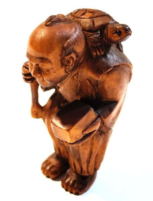 Hardhouten Netsuke van een man met schildpad op de rug Japan, Antiek en Kunst, Kunst | Niet-Westerse kunst, Ophalen of Verzenden