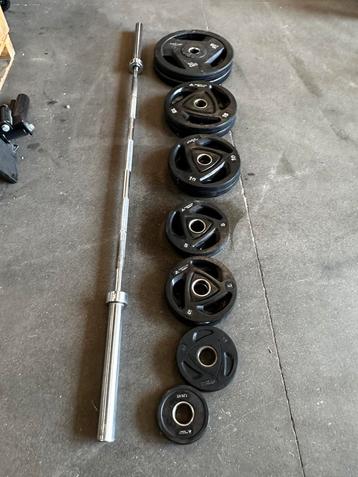 117,5kg Rubberen Gewichten + Olympische Barbell beschikbaar voor biedingen