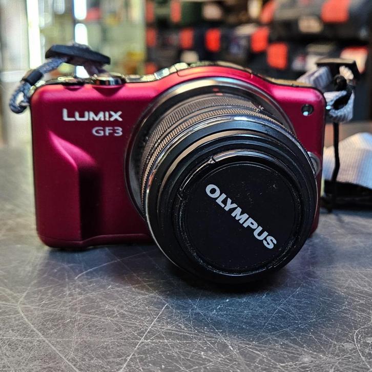 Lumix DMC-GF3 - Rood/Zwart + Panasonic Lumix G Vario 14-42mm, Audio, Tv en Foto, Fotocamera's Digitaal, Gebruikt
