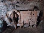 Oude houten dorsmachine, Ophalen