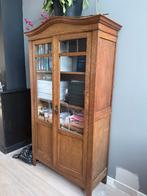 Houten kast met glazen deuren, Ophalen