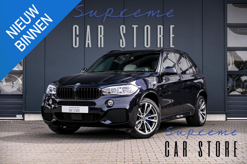 BMW X5 xDrive 50i M sport | Individual | NL Auto!, Automaat, Stof, Gebruikt, Zwart