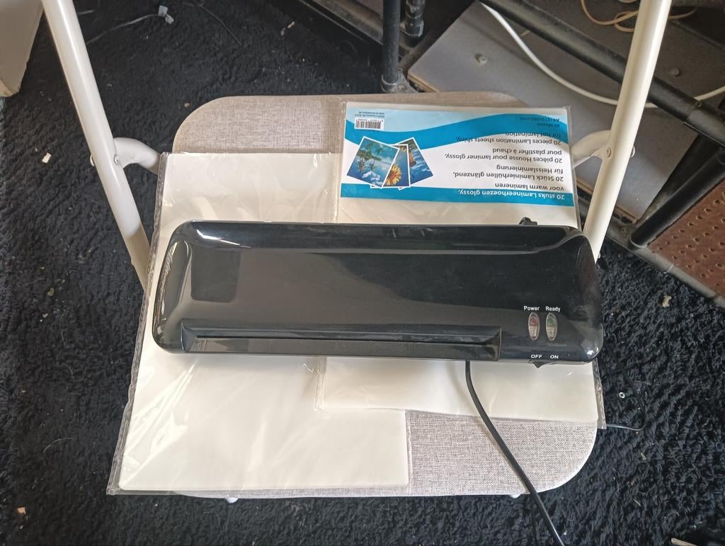 Lamineerapparaat met lamineerhoezen, Ophalen, Gebruikt
